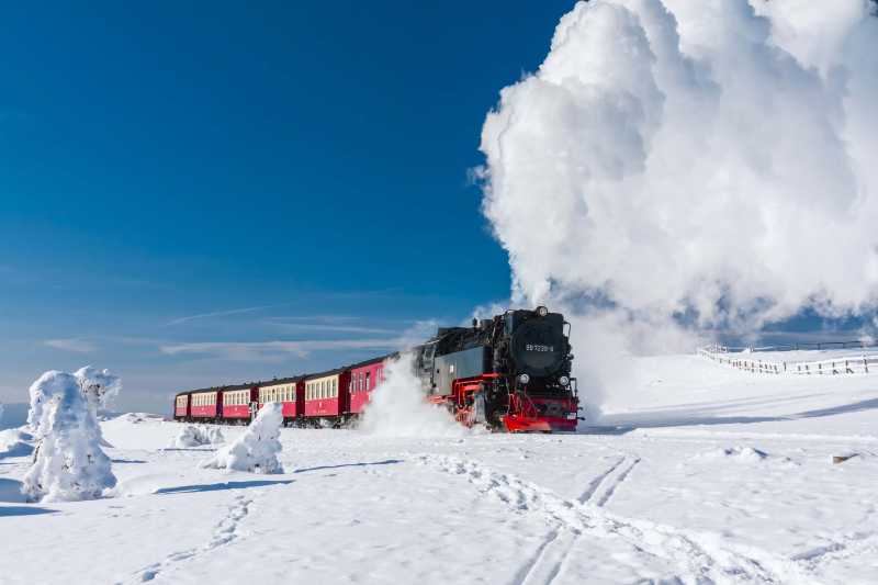 Steam train on the Brocken in a winter landscape - jigsaw puzzle