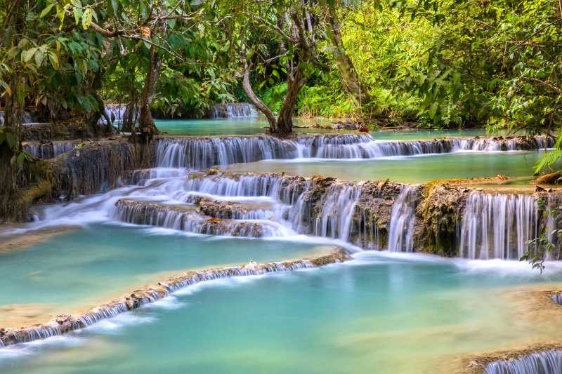 Kuang Si Falls and its emerald water pools - jigsaw puzzle