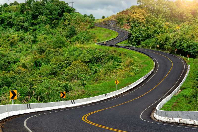 Road no.3 over top of mountains with green jungle in Nan province - jigsaw puzzle