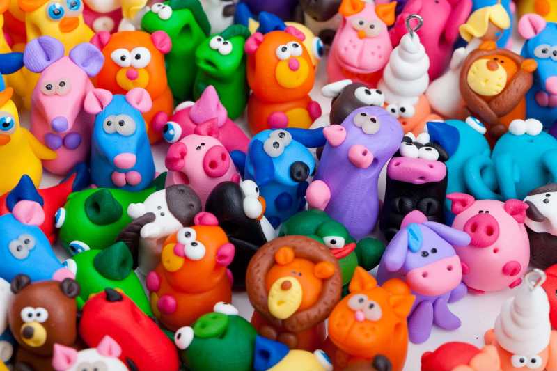 A bunch of clay animal toys