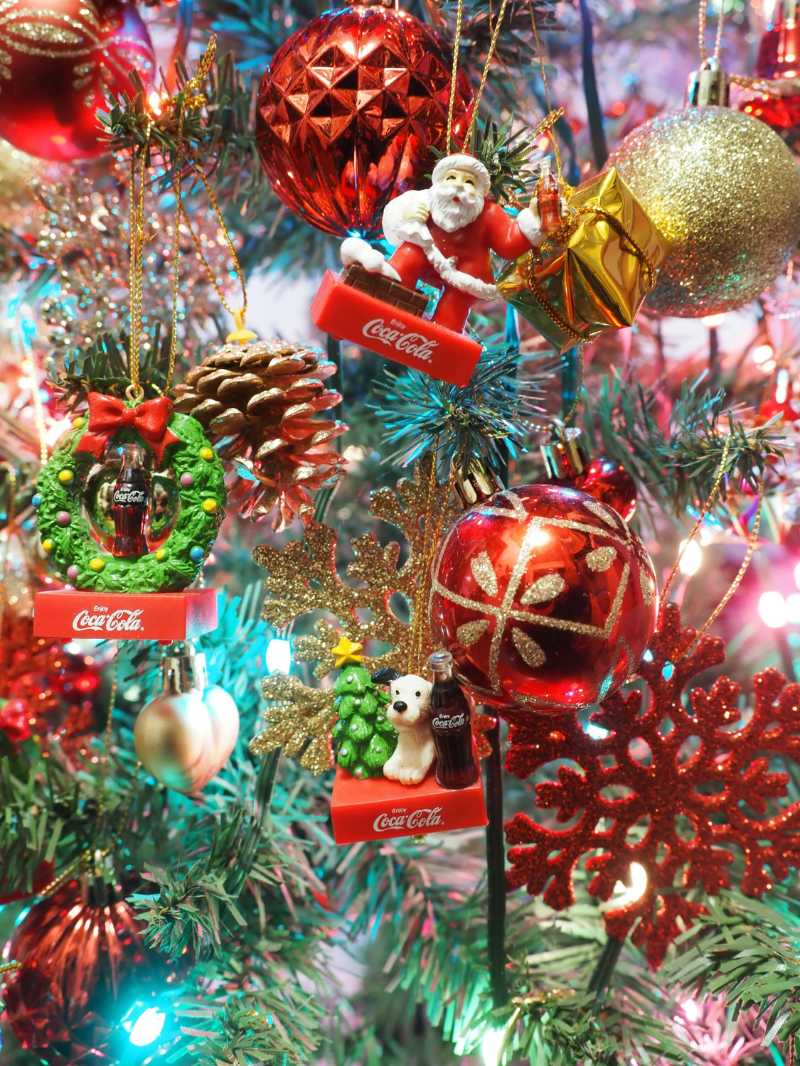 a close up of a christmas tree with ornaments - jigsaw puzzle