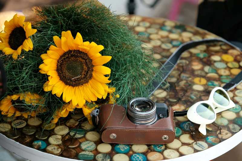 A Film Camera and Sunglasses