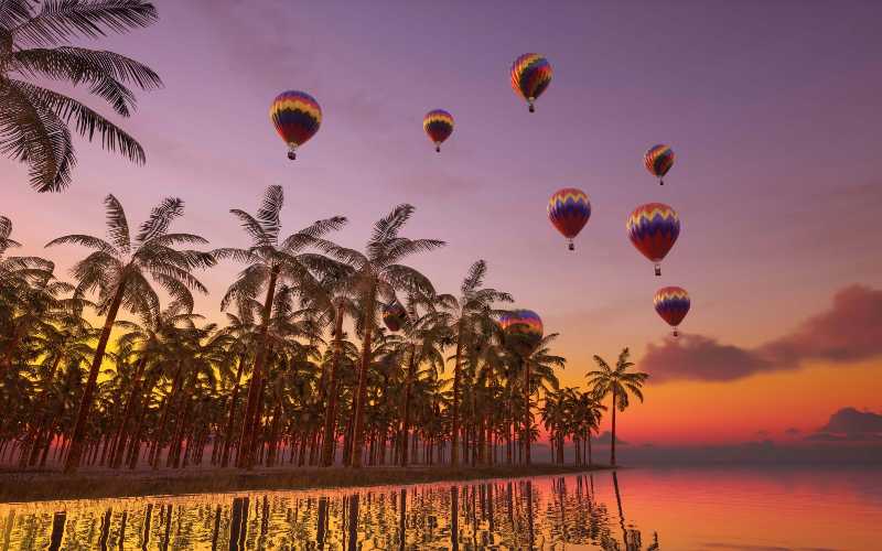 A group of hot air balloons flying over a body of water group of hot air balloons flying over a body of water