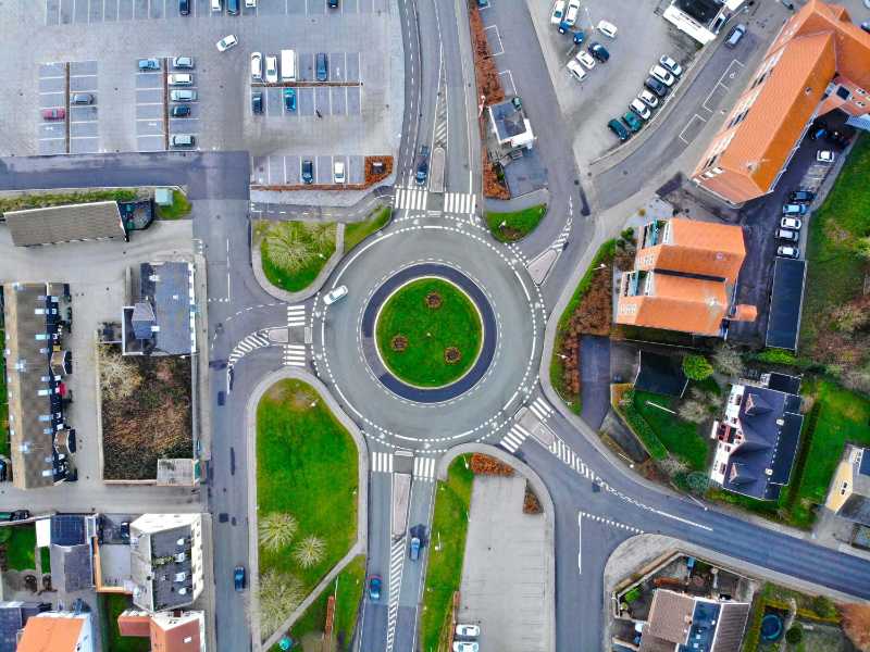 Aerial view of suburban area with roundabout intersection