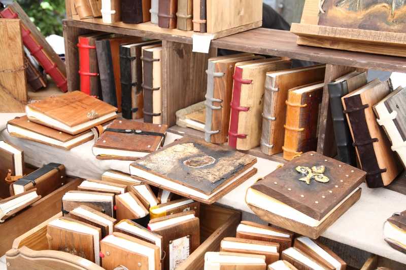 Antique Books Display on Wooden Shelves