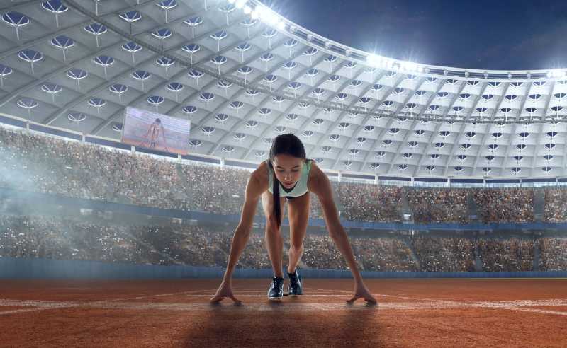 athlete woman on the starting blocks on sport championship - jigsaw puzzle