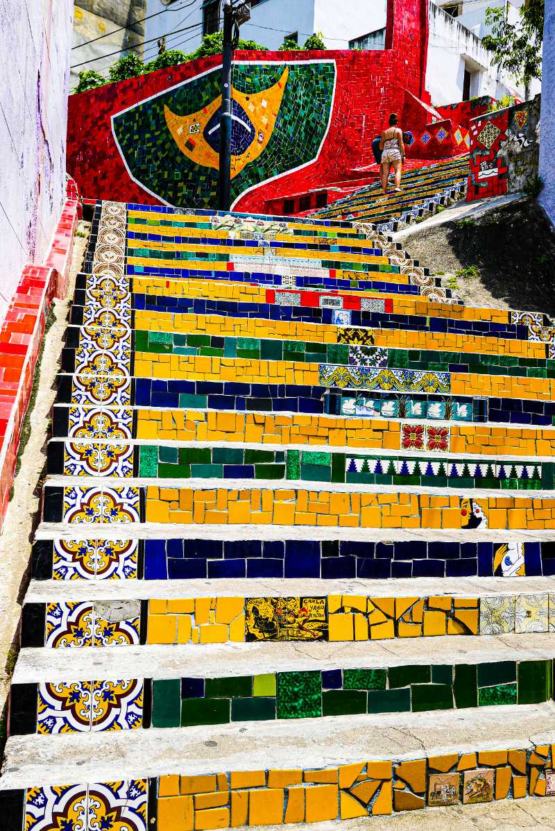 a colorful wall with a person standing on it - jigsaw puzzle