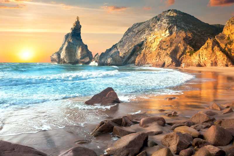 Beautiful stones beach at sundown time
