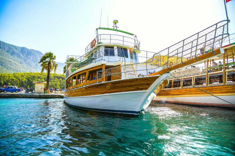 Brown and White Boat on Water