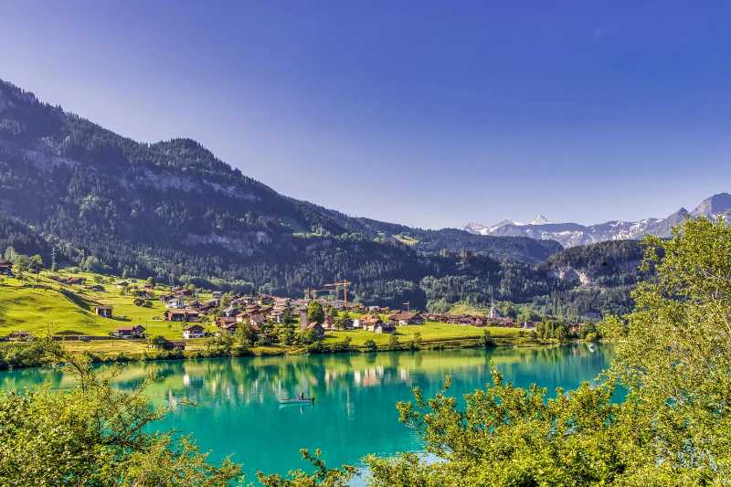 Captivating Swiss alpine lake scenery with serene reflections and vibrant colors