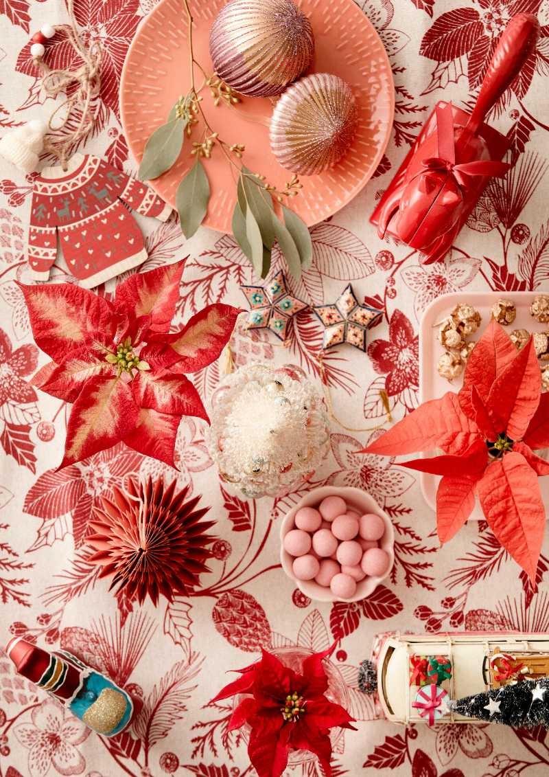 a table topped with plates of food and candy - jigsaw puzzle