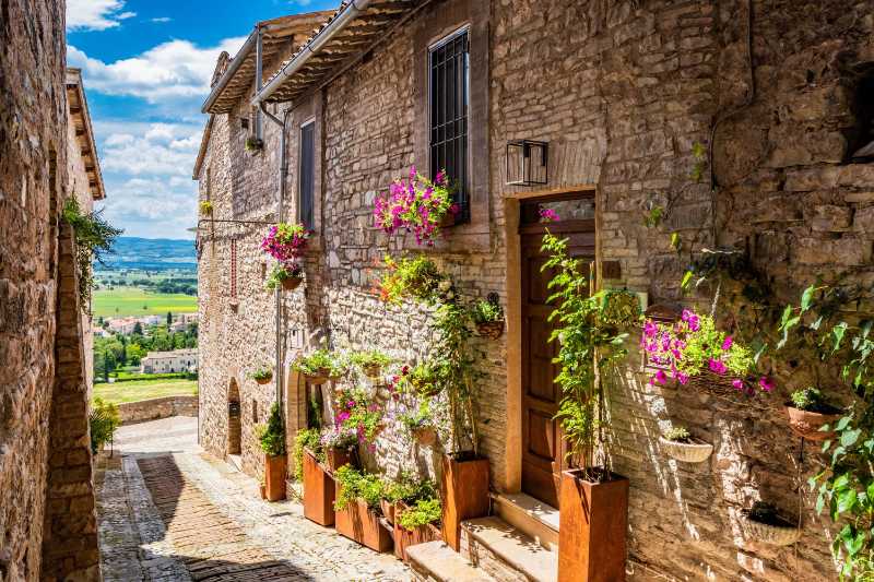 Charming Italian Hill Town Alley Medieval Stone Streets with Flowers