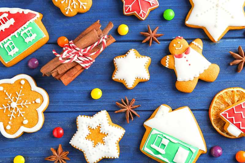 christmas cookies on blue wooden table