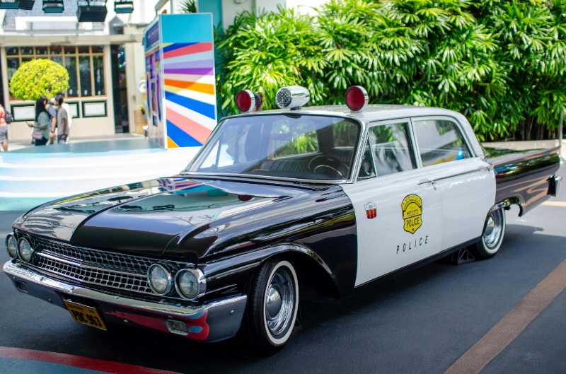 Classic Black and White Police Car Outdoors