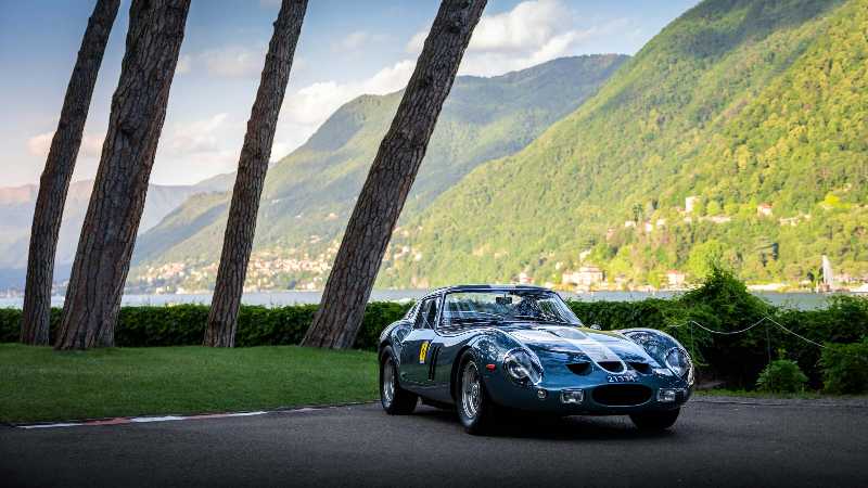 Classic Sports Car by Scenic Mountain Lake