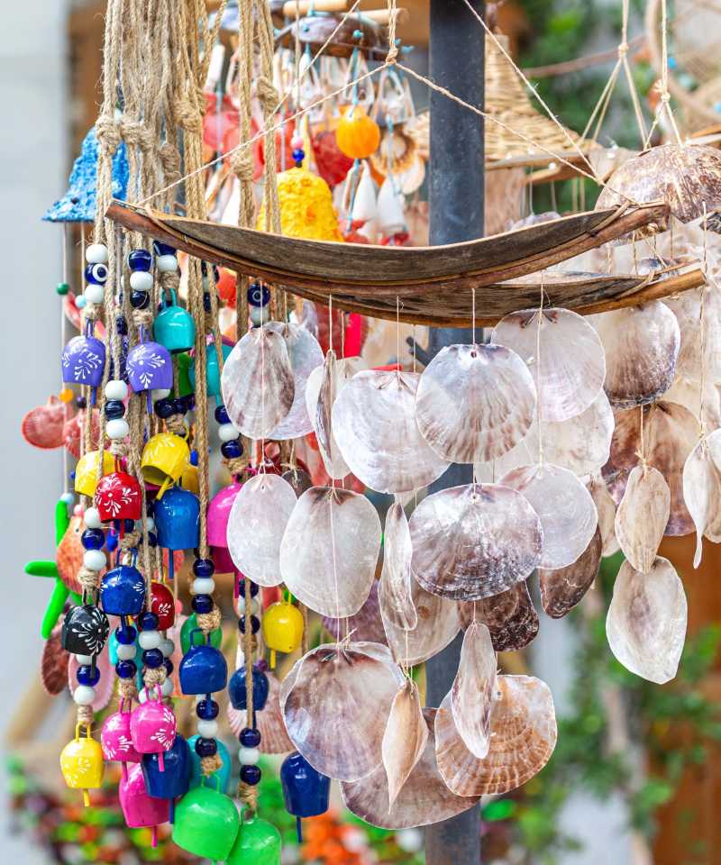 colorful handmade seashell and bead mobile in shop