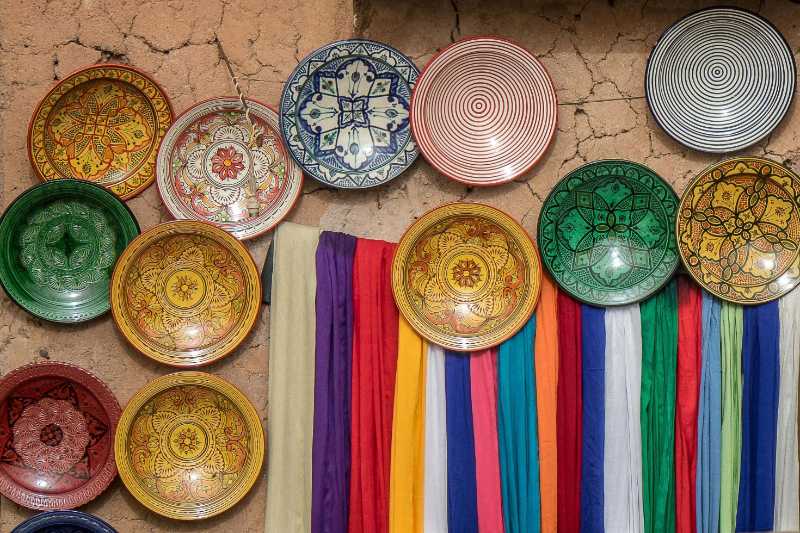 Colorful traditional plates on wall