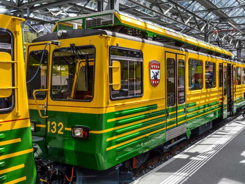 Colorful train at a Swiss station