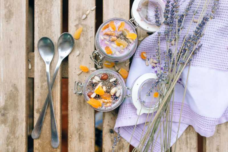 Delicious Jars of Desserts Beside Lavender Flowers