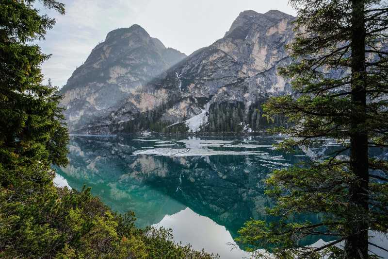 mountains near body of water panoramic photo - jigsaw puzzle