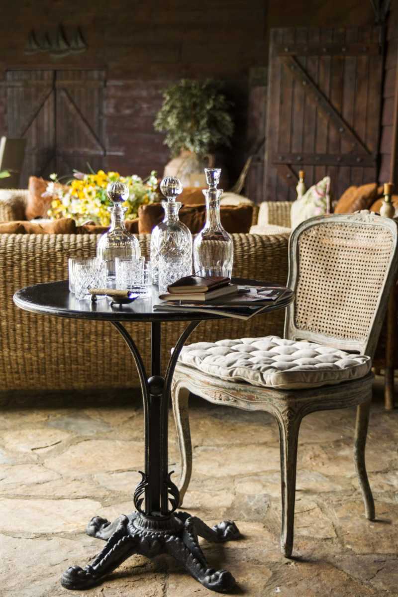 Elegant Rustic Decor Vintage Cane Chair and Bistro Table Setting