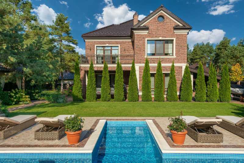 Exterior of residential mansion with terrace