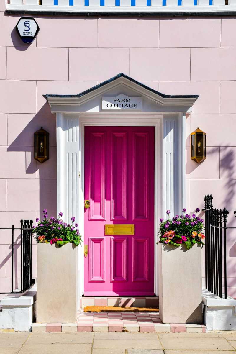 Facade of a Townhouse with Pink Entrance Door