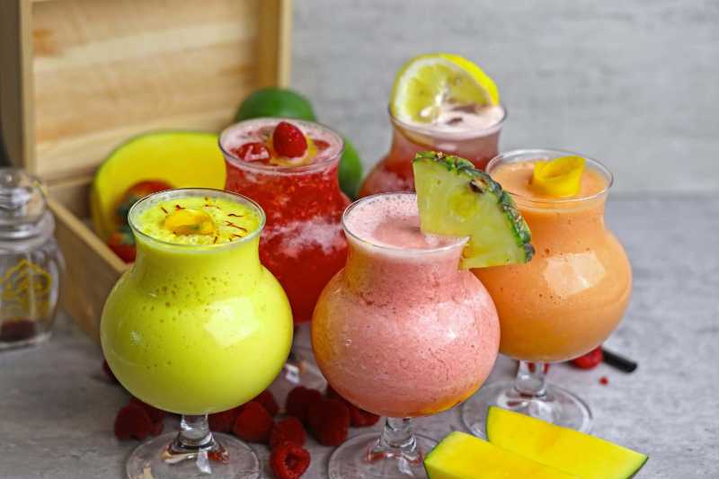 Five Colorful and Exotic Fruit Smoothies in Glasses