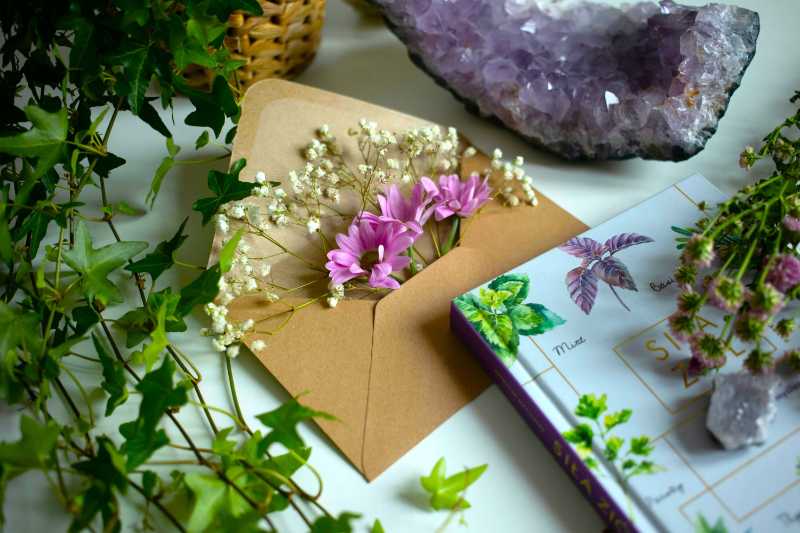 Flowers in an Envelope and Crystals on a Table