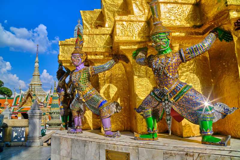 Grand Palace Bangkok Iconic Yaksha Guardian Statues and Golden Chedi