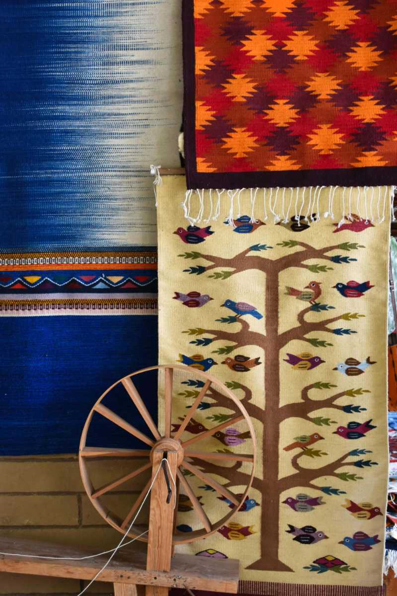 Handmade Southwestern Wool Textiles and Wooden Spinning Wheel