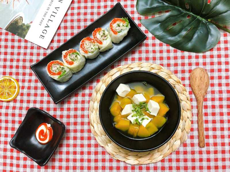 Healthy Asian Meal Fresh Spring Rolls and Pumpkin Tofu Soup