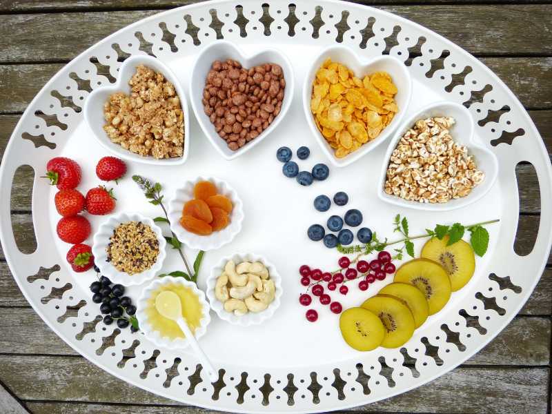Healthy Breakfast Platter Granola Cereal Nuts and Fresh Fruit Board