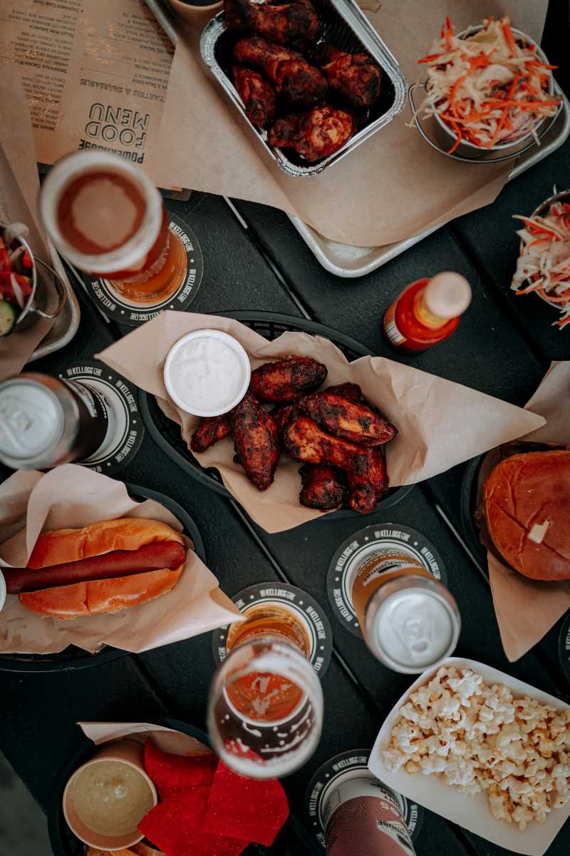 a table topped with lots of food and drinks - jigsaw puzzle