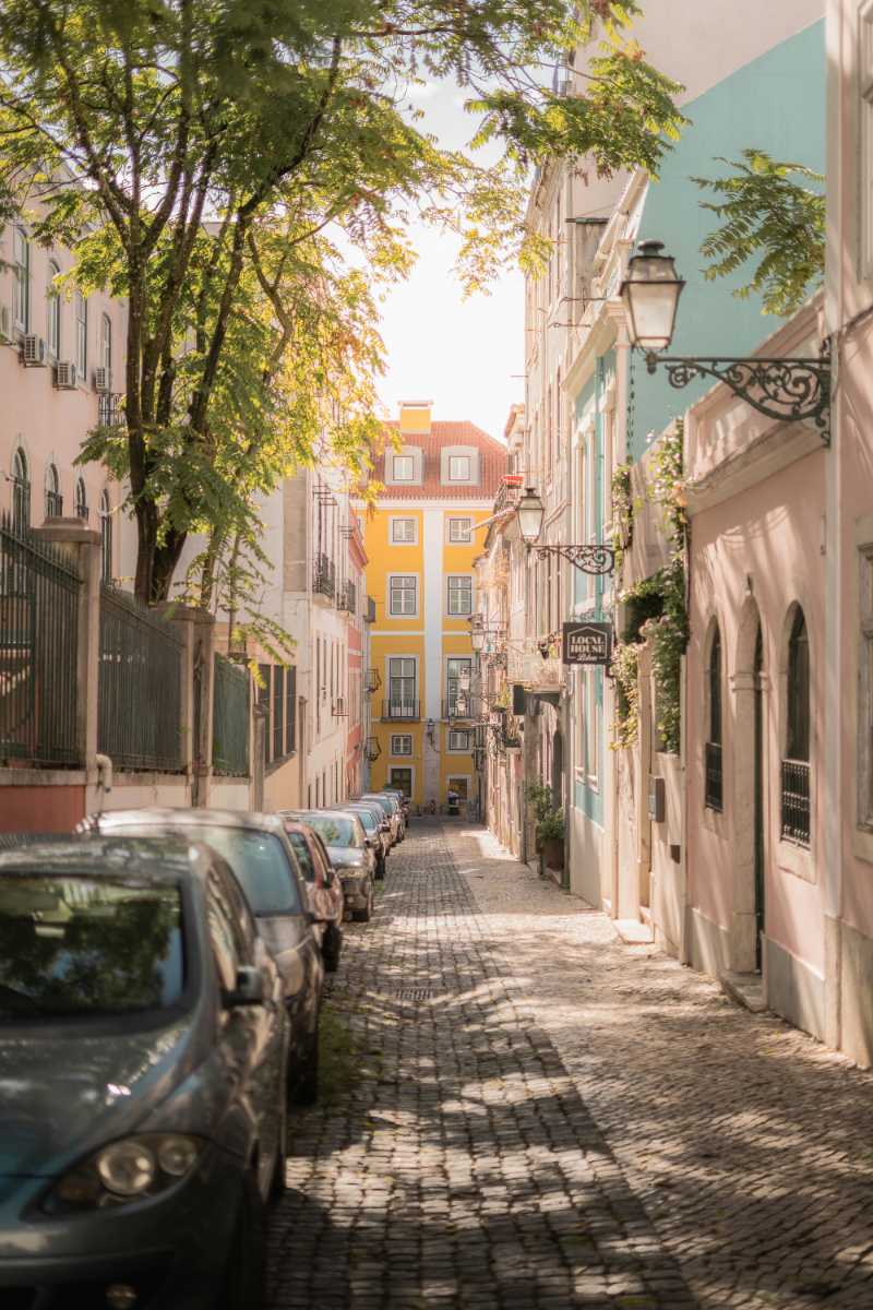 a car parked on the side of a street - jigsaw puzzle