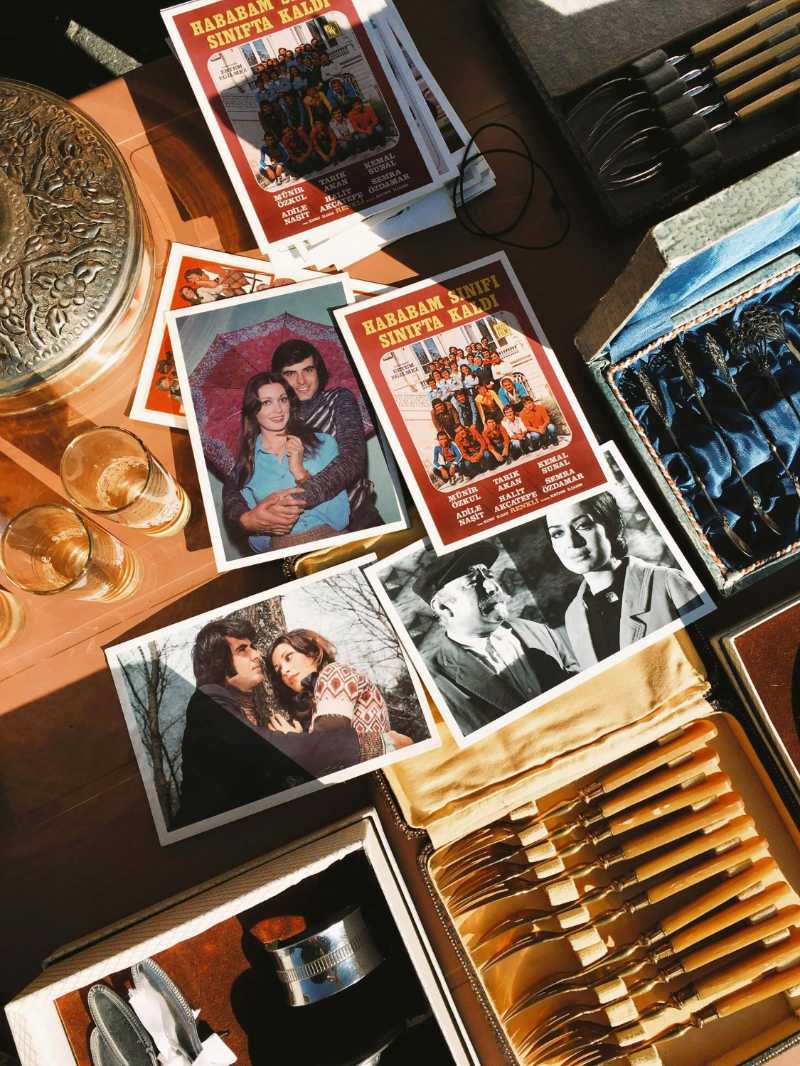 Old Photographsof old Turkish movie on a Table