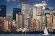 cityscape during nighttime near body of water and sail boat - jigsaw puzzle