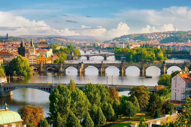 Prague Cityscape with Vltava River and Charles Bridge
