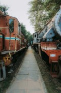 a row of train cars sitting next to each other - jigsaw puzzle