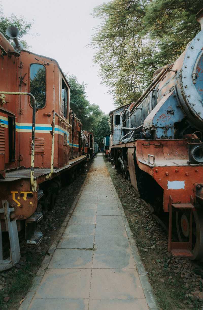 a row of train cars sitting next to each other - jigsaw puzzle