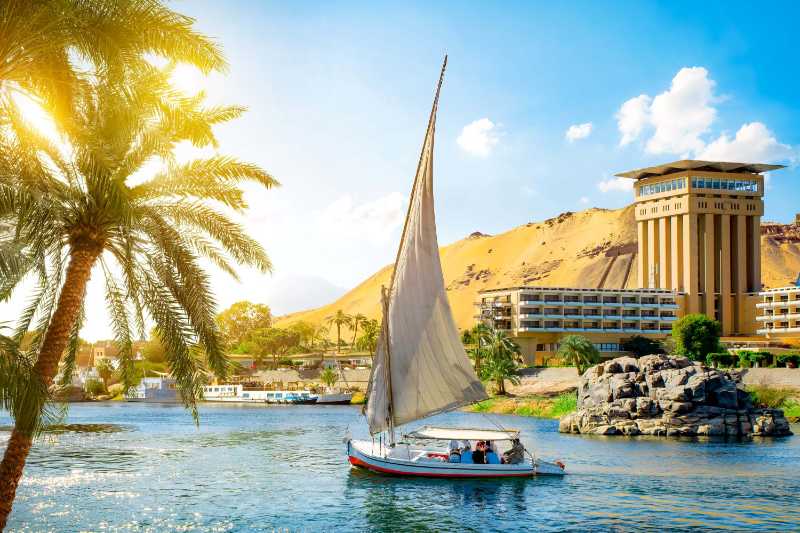 River nile and boats at sunset in aswan