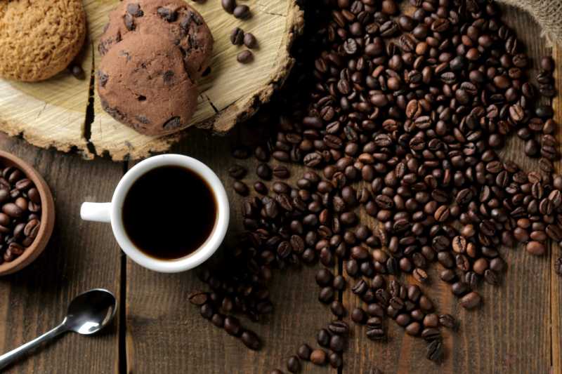 roasted coffee grains and a cup of coffee and cookies - jigsaw puzzle