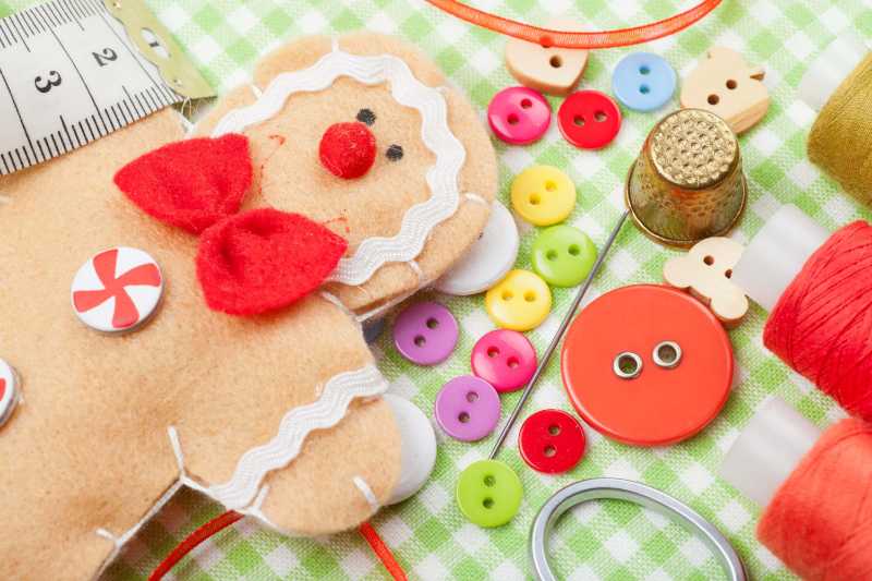 Sewing set and handmade gingerbread man from textile
