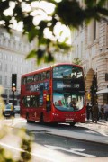 a double decker bus on the street - jigsaw puzzle