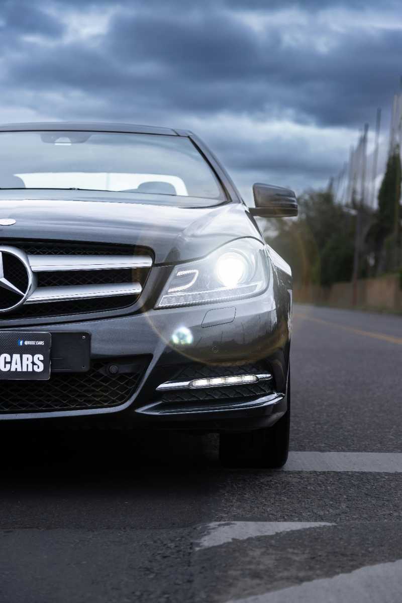 a modern mercedes car on an asphalt road - jigsaw puzzle