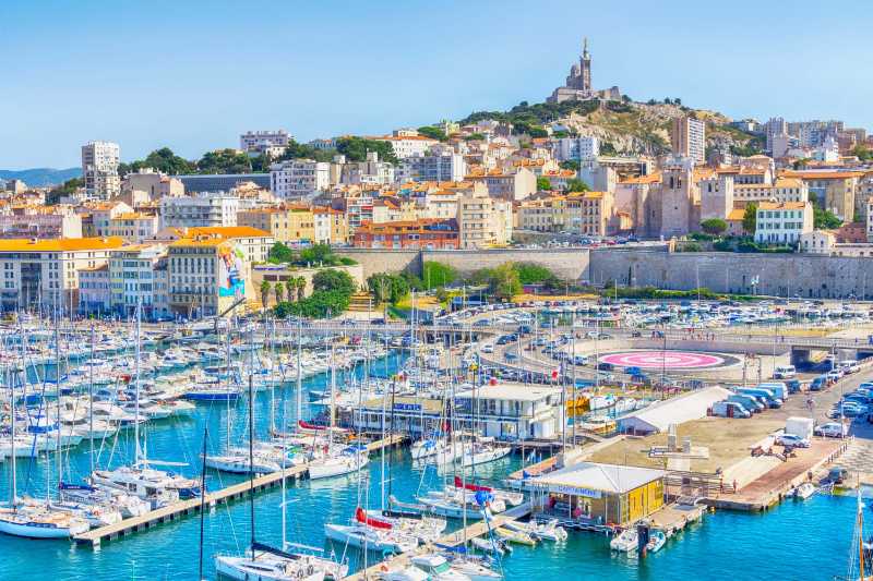 Sunny View of Marseilles Old Port and Notre-Dame de la Garde Basilica