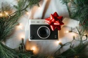 a christmas tree with a camera and a red bow - jigsaw puzzle