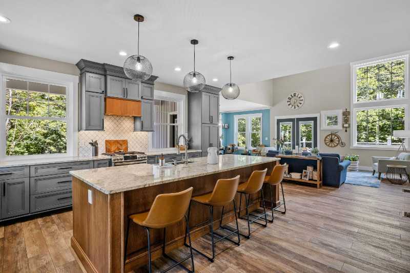 the interior design of a beautiful kitchen with a large island - jigsaw puzzle