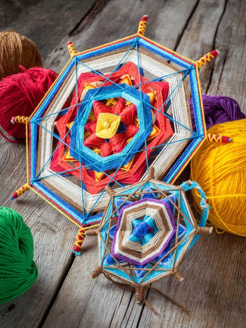 Two knitted tibetan mandala from threads and yarn