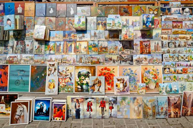 Variety of paintings at outdoor art market